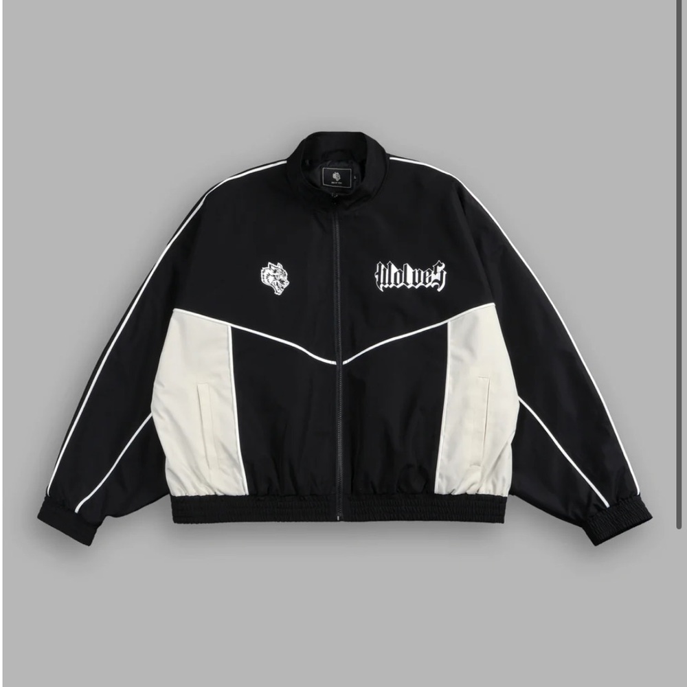 OUR PASSION QUINN UNISEX TRACK JACKET IN BLACK/SAND